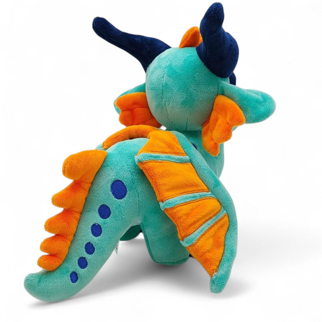 Peluche dragon féérique turquoise flamboyant