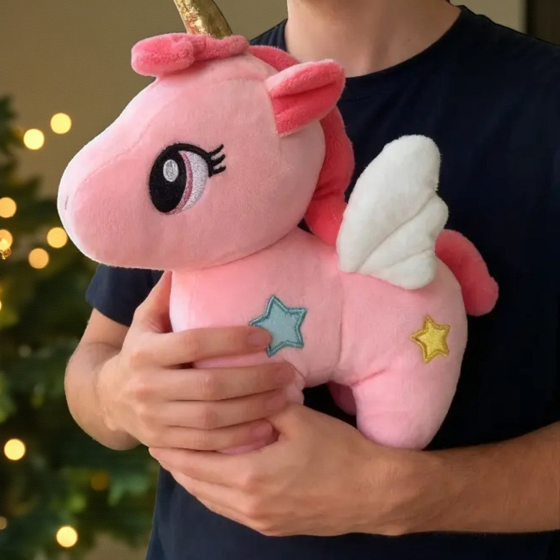 Süßes Einhorn-Plüschtier mit Sternen und magischen Flügeln
