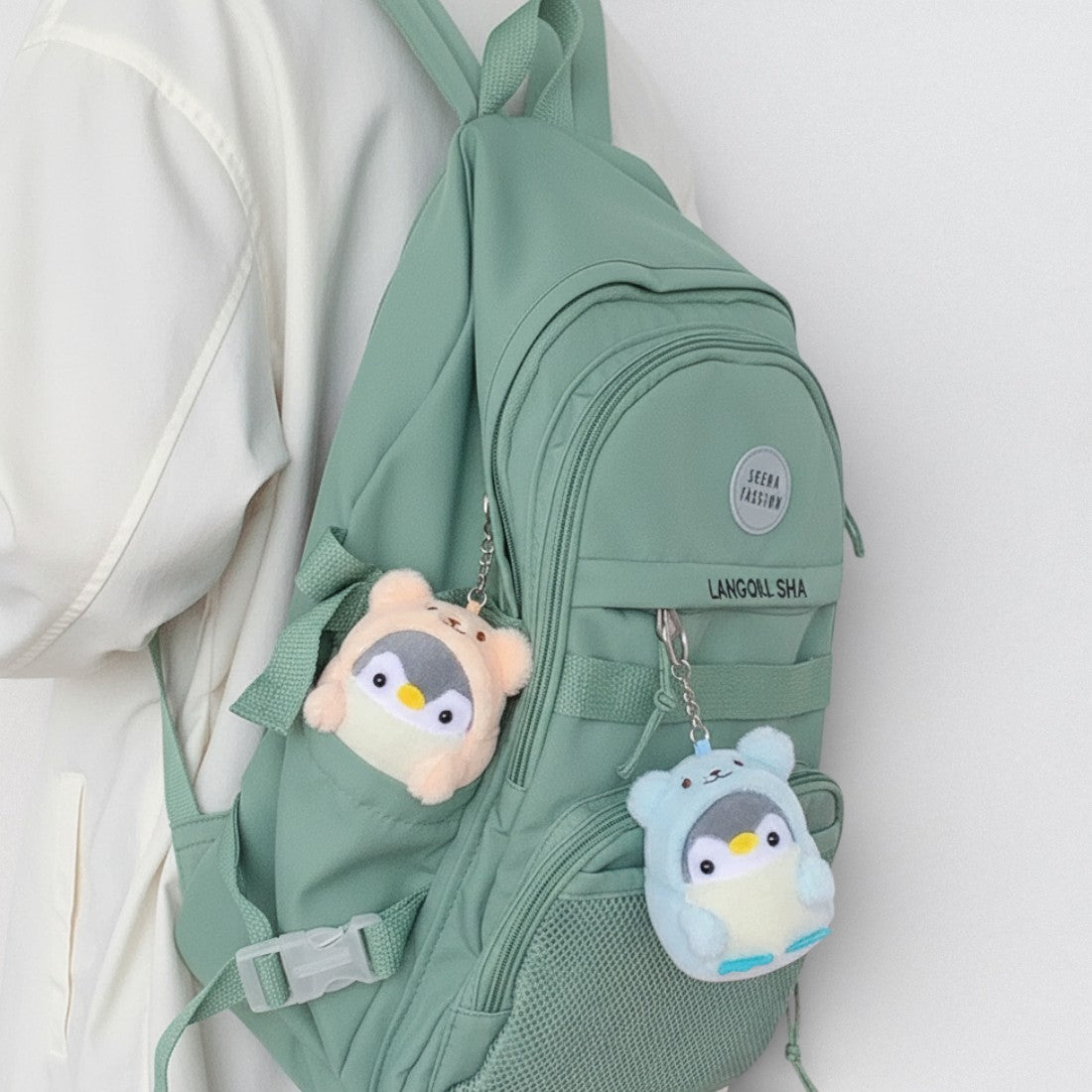 Schlüsselanhänger Pinguin im Bärenkostüm