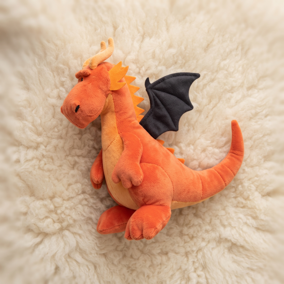 Peluche Dragon Orange avec Ailes Noires