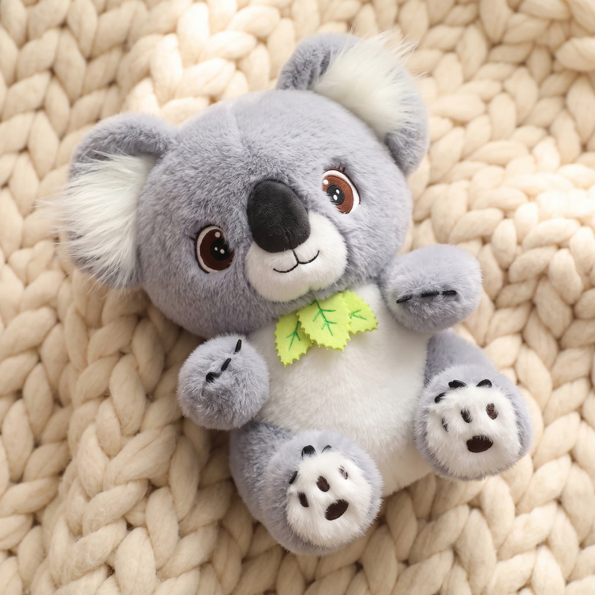 Plüschtier Koala Grau mit Eukalyptusblatt